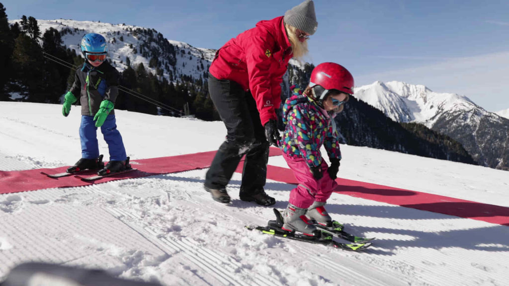 First steps in skiing. Learn how to brake.